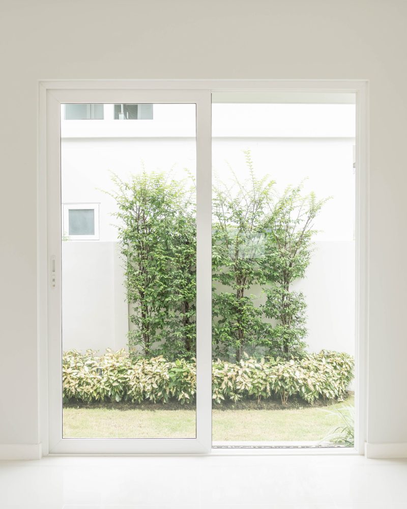 empty glass door in living room interior background